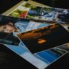 Collection of printed photographs featuring various subjects and moods.